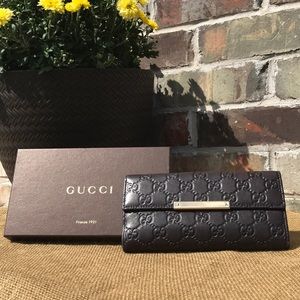 Gucci Guccissima leather embossed logo wallet